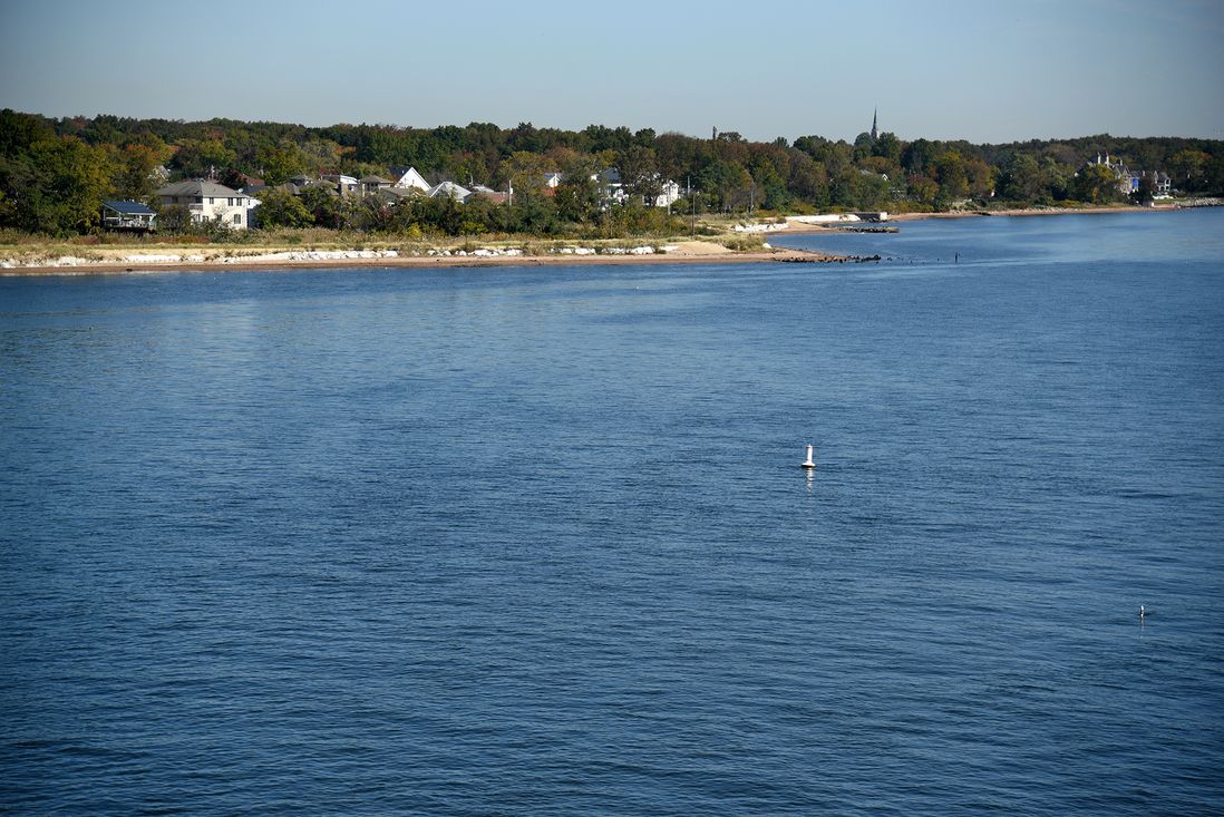 The coast of Tottenville, as seen from the barge mounted equilibrium crane. Homes here are built just a few dozen yards from the water’s edge, October 27th, 2021.
